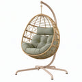 Poltrona sospesa da giardino 105 x 105 x 195 cm in metallo e fibra intrecciata beige con seduta verde salvia - stile boho